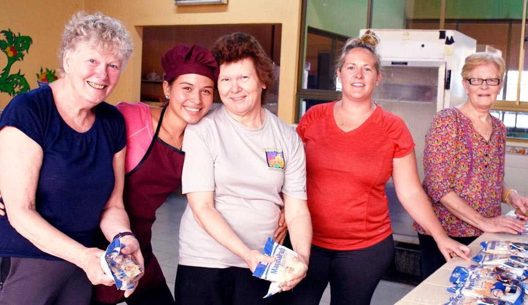 Volunteers helping in the kitchen